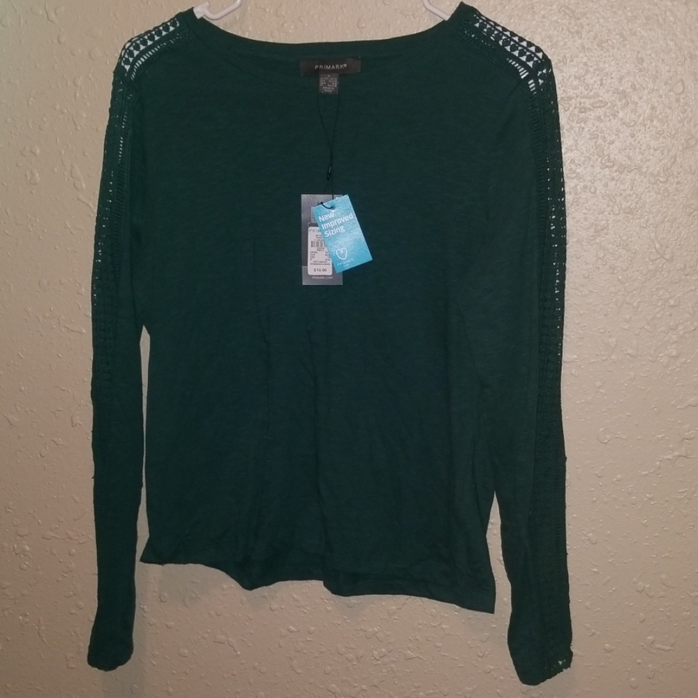Primark peekaboo green long sleeved shirt